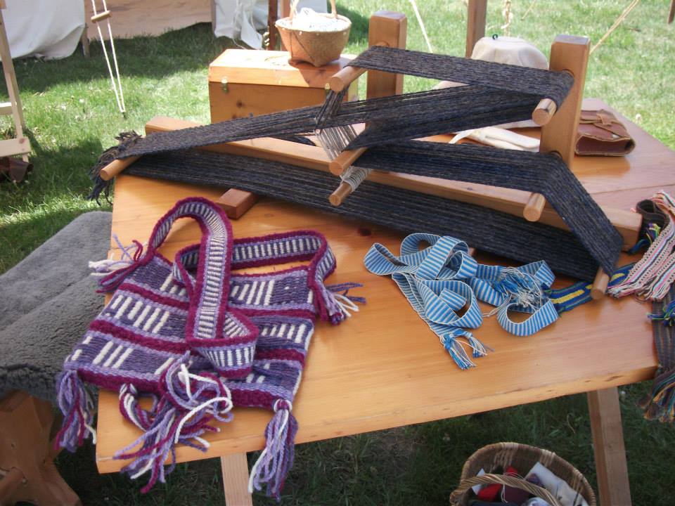 Inkle loom weaving - this weaves long strips and straps. 