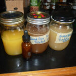 Completed strained bitters, and smaller bottle for mixing.