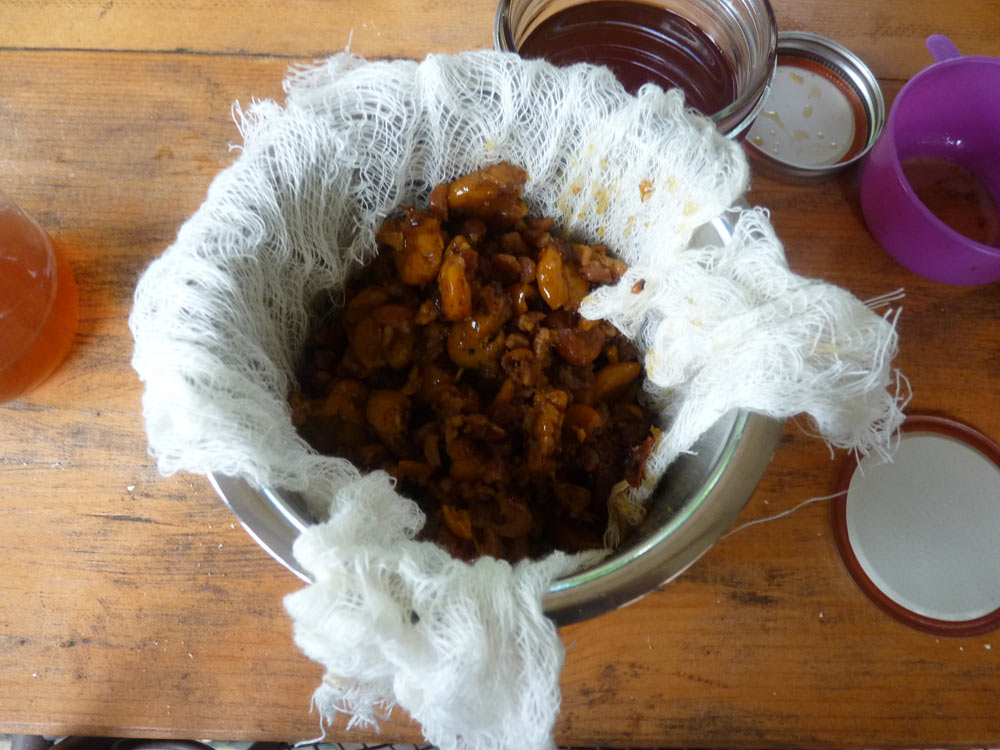 Haws in cheesecloth inside cylinder