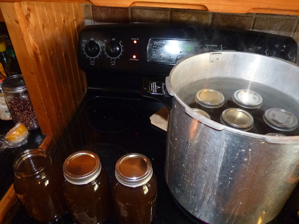 Stock that has been strained, ready to go into the pressure canner!