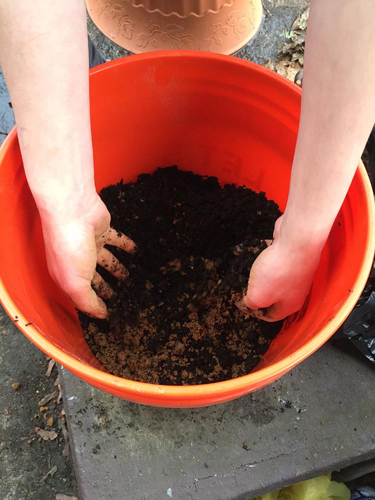 Mixing the clay and compost