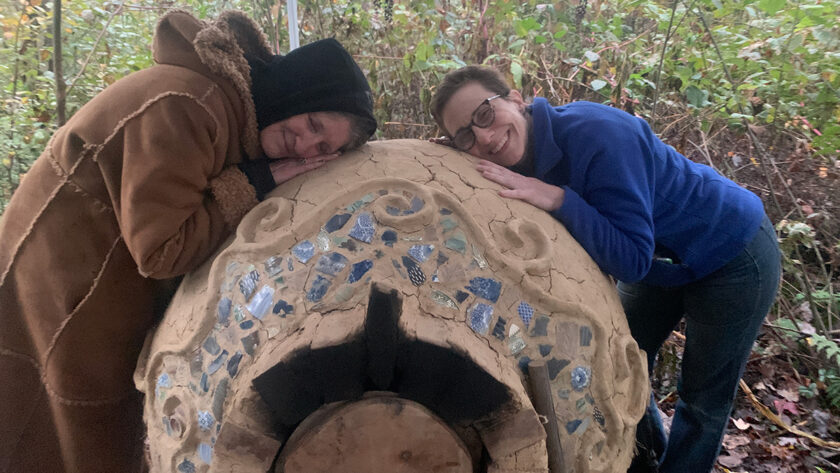 Friends enjoying the hot oven