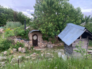 Where I stayed--the Gnome Dome with the outhouse in front