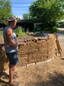 Shaping the strawbale wall....