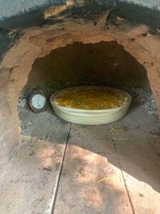 Macaroni and Cheese baking in an earthenware casserole dish at 400 degrees - no issues