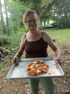 My mom is an excellent pizza maker and pizza runner!