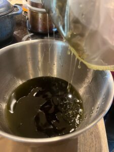 Straining salve through a jelly bag