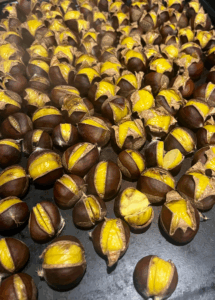Roasted chestnuts ready to peel! This is how they should look--open and ready!